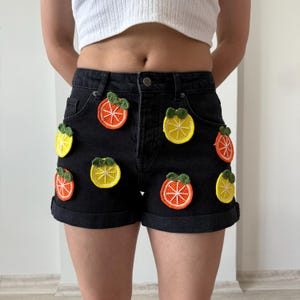 Black Denim Shorts with Crochet Citrus Fruits – Handmade Summer Festival Outfit – Funky Embroidered Lemon Orange High Waist Shorts