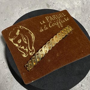 Fermaglio per capelli francese VINTAGE su carta originale Parure De La Coiffure color oro insolito retrò kitsch acquistato a Lione, Francia