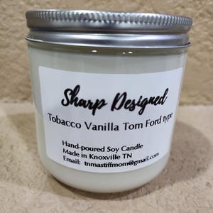Sharp Designed hand poured soy candle with a wood wick. Tobacco Vanilla Tom Ford type.