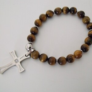 Tiger eye stretch bracelet with stainless steel cross and cubic zirconia, beaded golden brown