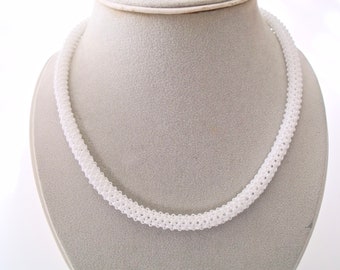 White beaded glass woven stretch necklace:  pearly rope