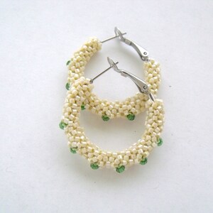 Creamy yellow hoop earrings, bead woven with peridot green glass crystals earrings 1.25&quot;