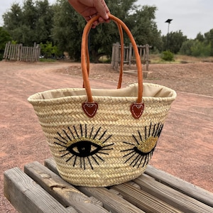 Handmade Moroccan Straw Basket with Black Evil Eye Embroidery – Woven Palm Tote Bag with Leather Handles – Boho Market Beach Gift Bag