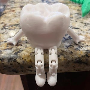 3D Printed Tooth Figurine with articulating legs