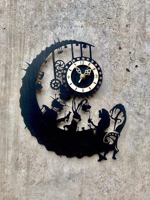 alicia en el pais de las maravillas reloj