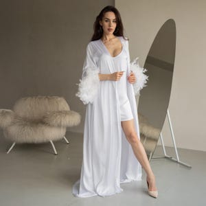 long sleeve white dress with feathers MARAYA White Long Sleeve Mini Feather Dress