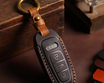 Suitable for Audi A4L keycase leather Q5L high-end protective shell A3A5 car A6L bag A7L buckle Q3Q7Q8A8