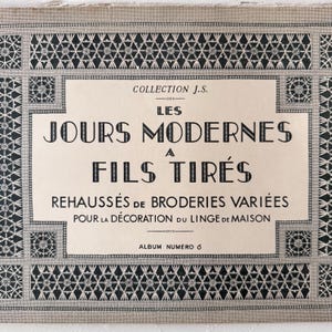 May include: A vintage textile design featuring geometric patterns in black and white. The central panel displays French text: "LES JOURS MODERNES À FILS TIRÉS," with additional text indicating it's an album for home linen decoration.