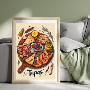 May include: A framed print depicting a vibrant illustration of tapas. The image shows a wooden serving board with an assortment of Spanish appetizers, such as prawns, cheese, olives, and cured meats. The word "Tapas" is written at the bottom.
