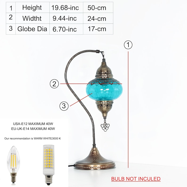 May include: A decorative table lamp with a turquoise glass globe, measuring 19.68 inches (50 cm) in height and 6.70 inches (17 cm) in diameter. The lamp has a bronze-colored metal base and a curved arm. The text "BULB NOT INCULED" is visible.