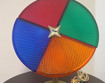 Antique silver christmas tree with color wheel