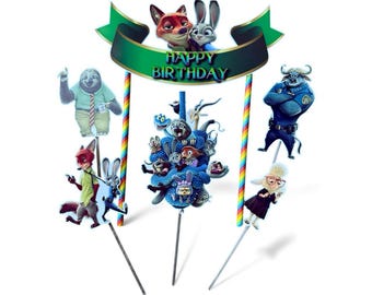 May include: A cake topper set with characters from the film Zootropolis. The set includes a banner reading "Happy Birthday" and various character cutouts, such as a fox, a rabbit, and a sloth. The characters are on sticks.