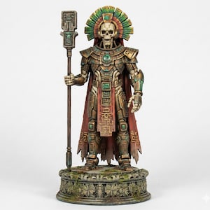 May include: A detailed figurine of a skeletal figure in ornate armor, holding a staff. The figure has a headdress with green and gold accents, a red cape, and stands on a decorative base. The armor is detailed with green and gold accents.