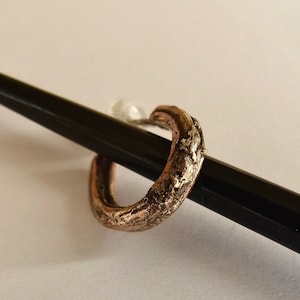 Men&#39;s fine silver unique hoop earring.