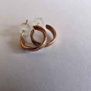 Men's copper and silver unique hoops earrings.