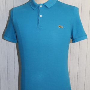 Vintage Men&#39;s Lacoste Blue polo shirt Size S