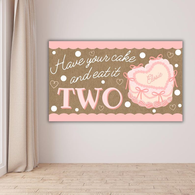 May include: A pink and brown birthday banner with the text "Have your cake and eat it TWO." A heart-shaped cake with the name "Elsie" is on the right. White polka dots and hearts decorate the banner.