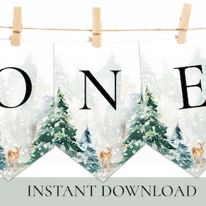 May include: A printable banner with a watercolor winter forest background. The banner says "ONE" in black letters and features a deer silhouette on each flag.