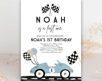 May include: A blue and white race car birthday invitation with black and white checkered flags and balloons. The invitation says "Noah is a fast one" and "Noah's 1st Birthday".