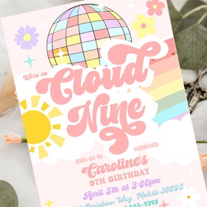 May include: A pink and white invitation with a rainbow and a disco ball. The text reads "Were on Cloud Nine Join us to celebrate Caroline's 9th Birthday April 5th at 3:00pm 3242 Rainbow Way. Mobile 36695 RSVP: Kim at 555-9392"