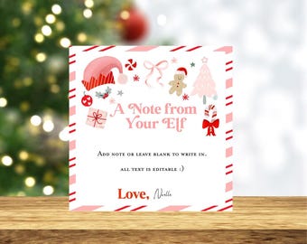 Puede incluir: Una tarjeta blanca con un borde rayado rosa y rojo. La tarjeta tiene un gorro de elfo rosa, un hombre de jengibre, un bastón de caramelo y un árbol de Navidad. El texto de la tarjeta dice "A Note from Your Elf" y "Love, Noelle".