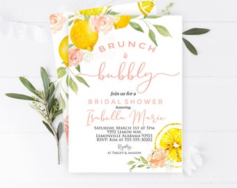 May include: A white bridal shower invitation with a watercolor illustration of lemons, flowers, and greenery. The text reads "Brunch & Bubbly" and includes the bride's name, date, time, location, and RSVP information.