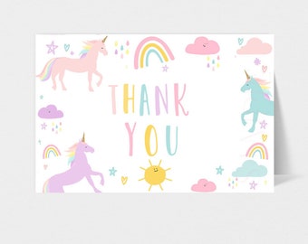 May include: A white thank you card featuring a pink and blue unicorn, rainbow, and clouds. The text "Thank You" is written in pink and yellow lettering.