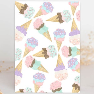 May include: A seamless pattern featuring pastel-colored ice cream cones with sprinkles and different colored scoops of ice cream. The background is white.