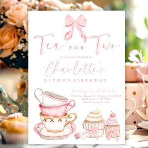 May include: A pink and white tea party invitation for a second birthday. The invitation features a stack of teacups, cupcakes, and a pink bow. The text on the invitation reads "Tea for Two" and "Charlotte's Second Birthday".