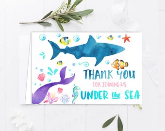 May include: Thank you card with a blue shark, purple mermaid tail, and colorful sea creatures. The text reads "Thank You for joining us Under the Sea".