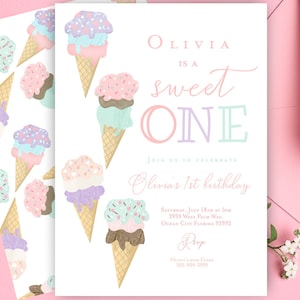 May include: A pink and white invitation with a pastel ice cream cone design. The text reads "Olivia is a sweet one" and includes details for a first birthday party.