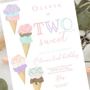 May include: A pink and white invitation with a colorful ice cream cone design. The text reads "Olivia is Two Sweet" and includes details for a birthday party.