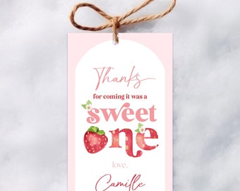 Puede incluir: Etiqueta de agradecimiento rosa y blanca con el texto "Gracias por venir, fue un día dulce" con un gráfico de fresa y el nombre "Camille".