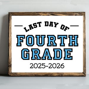 May include: A framed print with the text "LAST DAY OF FOURTH GRADE 2025-2026". The text is in black and blue, with a wooden frame.