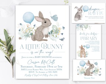May include: A blue and white baby shower invitation with a watercolor illustration of a bunny rabbit holding a blue balloon. The text reads "A Little Bunny is on the way!" and includes the baby's name, Carson McCall, the date and time of the shower, and the address.