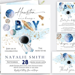 May include: A set of space-themed baby shower invitations and cards. The main invitation features an astronaut holding planet balloons, with the text "Houston we're having a BOY." Additional cards include "Books for baby," "Diaper raffle," and a thank you card.