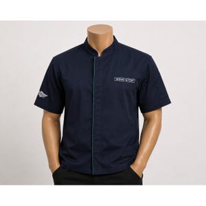 May include: A dark navy blue short-sleeve chef coat featuring a mandarin collar, a concealed front button placket with teal piping, and the white embroidered text WING STOP on the left chest, with a matching white logo on the right sleeve.