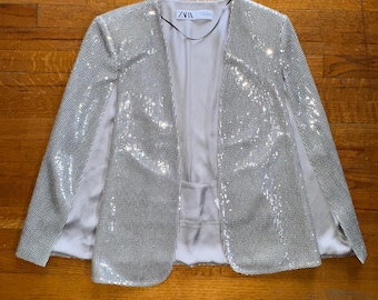 Chaqueta tipo capa con lentejuelas plateadas de Zara para mujer, con frente abierto, ideal para fiestas, talla XS, 2687/001/808