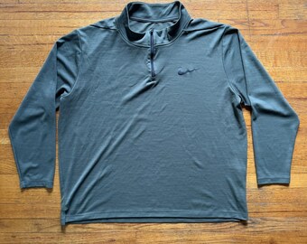 Sudadera Nike Dri-FIT de manga larga con media cremallera, ideal para entrenamiento, color oliva, talla M.
