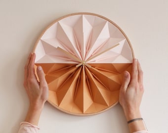 Wooden origami wall clock