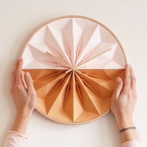 Wooden origami wall clock