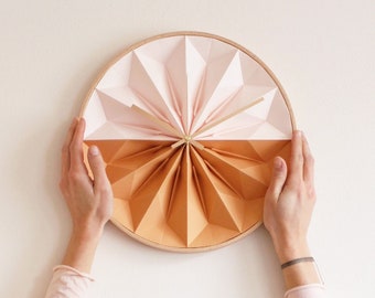 Wooden origami wall clock