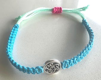 Charmed Loop: Silver Charm Knotted Adjustable Bracelet