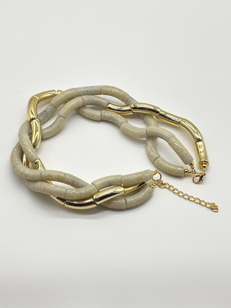 Handcrafted Luxurious Three Layered Fringe Statement Necklace main image 0