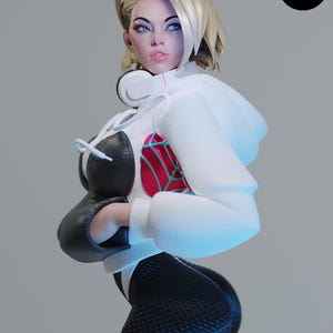 Op de afbeelding: Beeldje van een vrouwelijk personage met blond haar, blauwe ogen en een witte hoodie. Het figuur draagt zwart-witte kleding en heeft een koptelefoon om de nek. Het figuur heeft een rood-blauw ontwerp op de borst. Het logo "esmonster" staat onderaan.