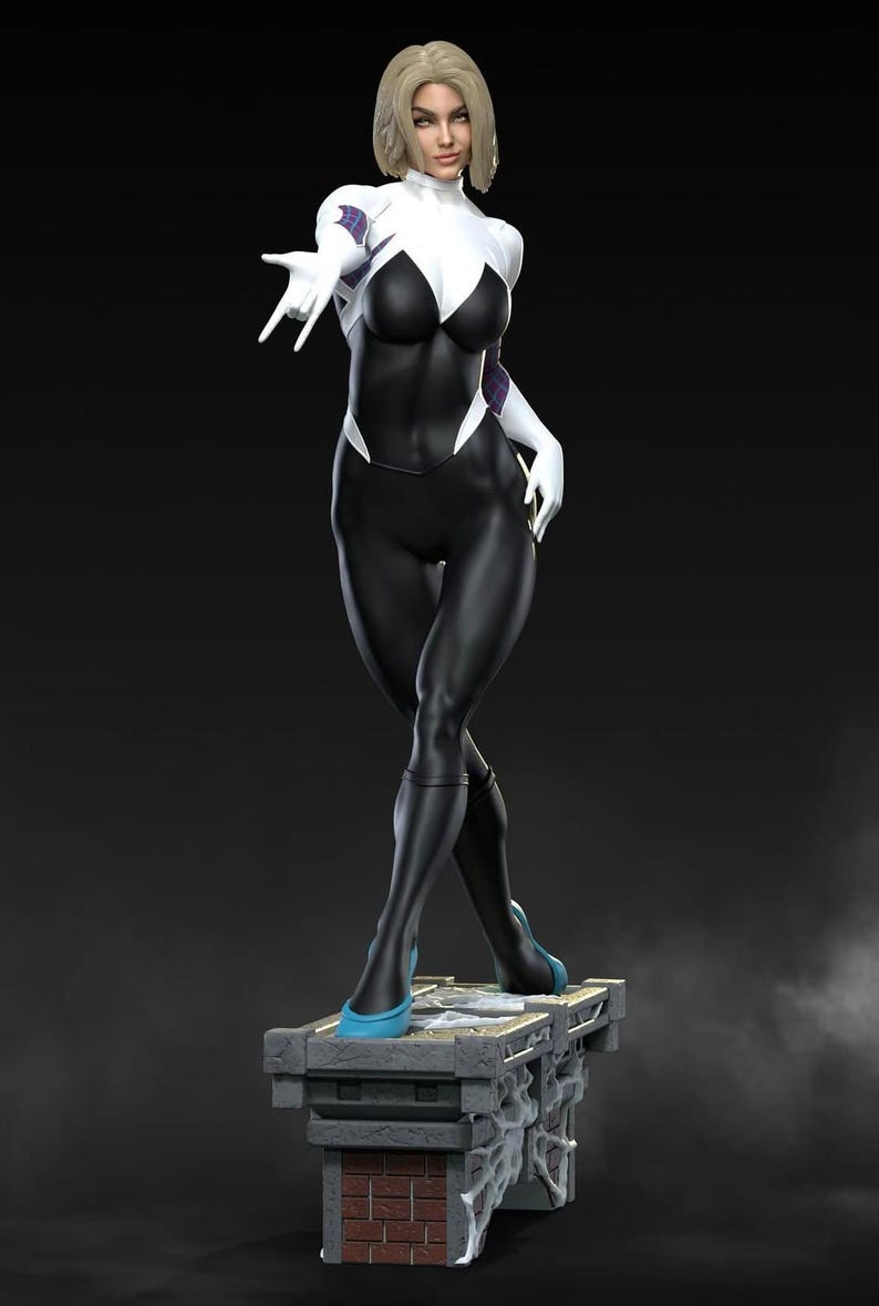 May include: A statue of a female superhero in a black and white bodysuit with a spider-web design. She has blonde hair and is standing on a rooftop base. Her boots are a bright blue colour.