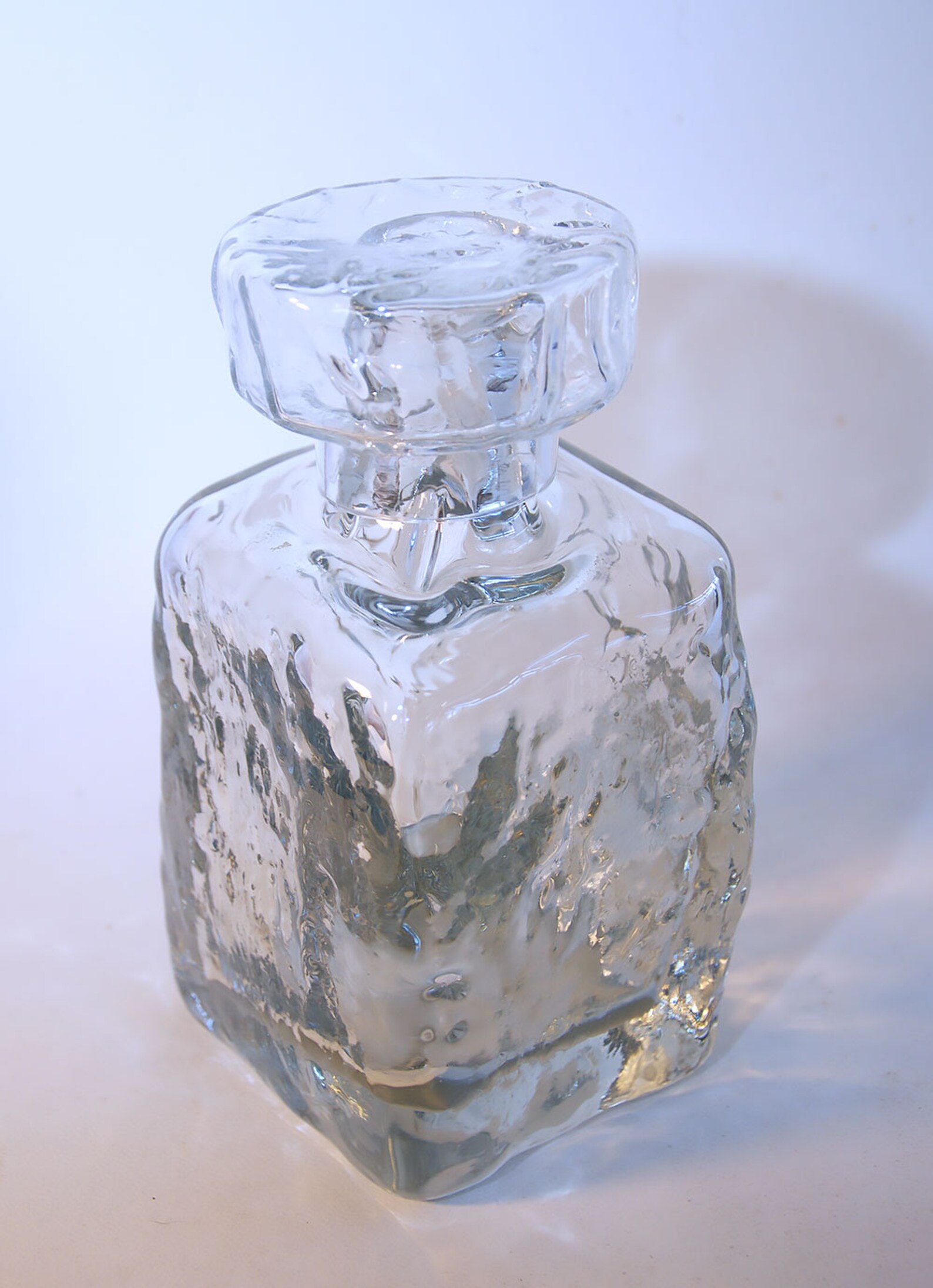 Curated visual reference: Visual Reference: Ice Cube Texture Heavy Glass Whisky Alcohol Decanter Design