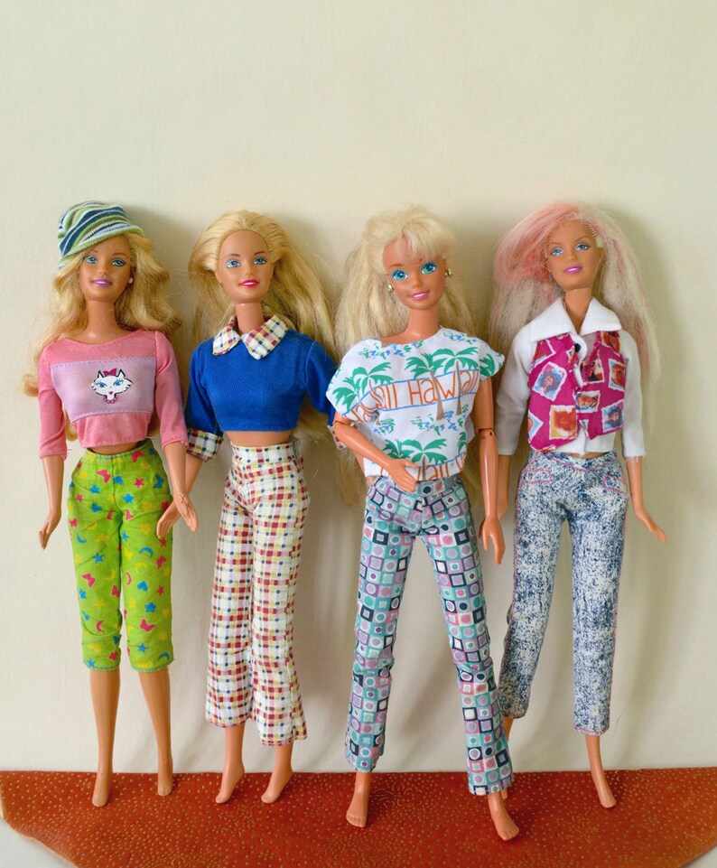 4 barbie friends