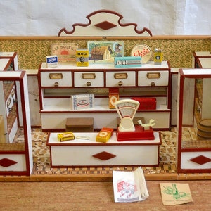 Muñeca Puppenhaus antigua vintage de madera suiza alemana de la década de 1890/1910 Tienda de comestibles Tienda de alimentos Paquetes de miniaturas Productos Supermercado Casa de muñecas
