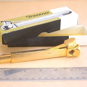 Donatus Cigar Cutter - Etsy